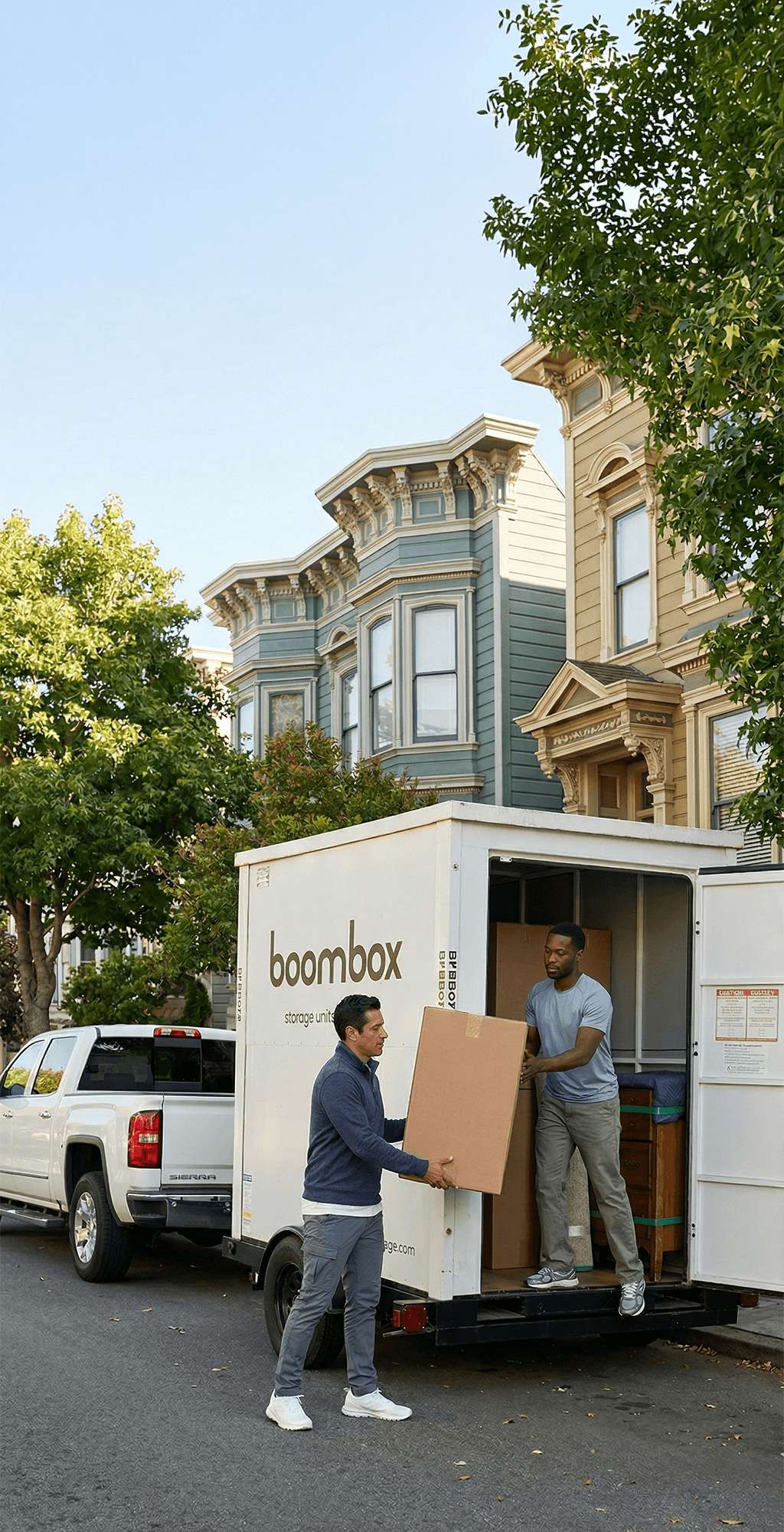 Professional movers helping load items into storage unit